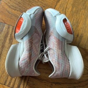 Nike White and Orange Sneakers with Streamlined Silhouette